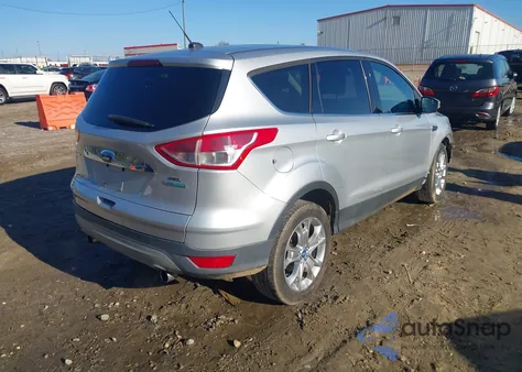 2013 Ford Escape Sel z USA, uszkodzony, nr VIN 1FMCU0H93DUA79422